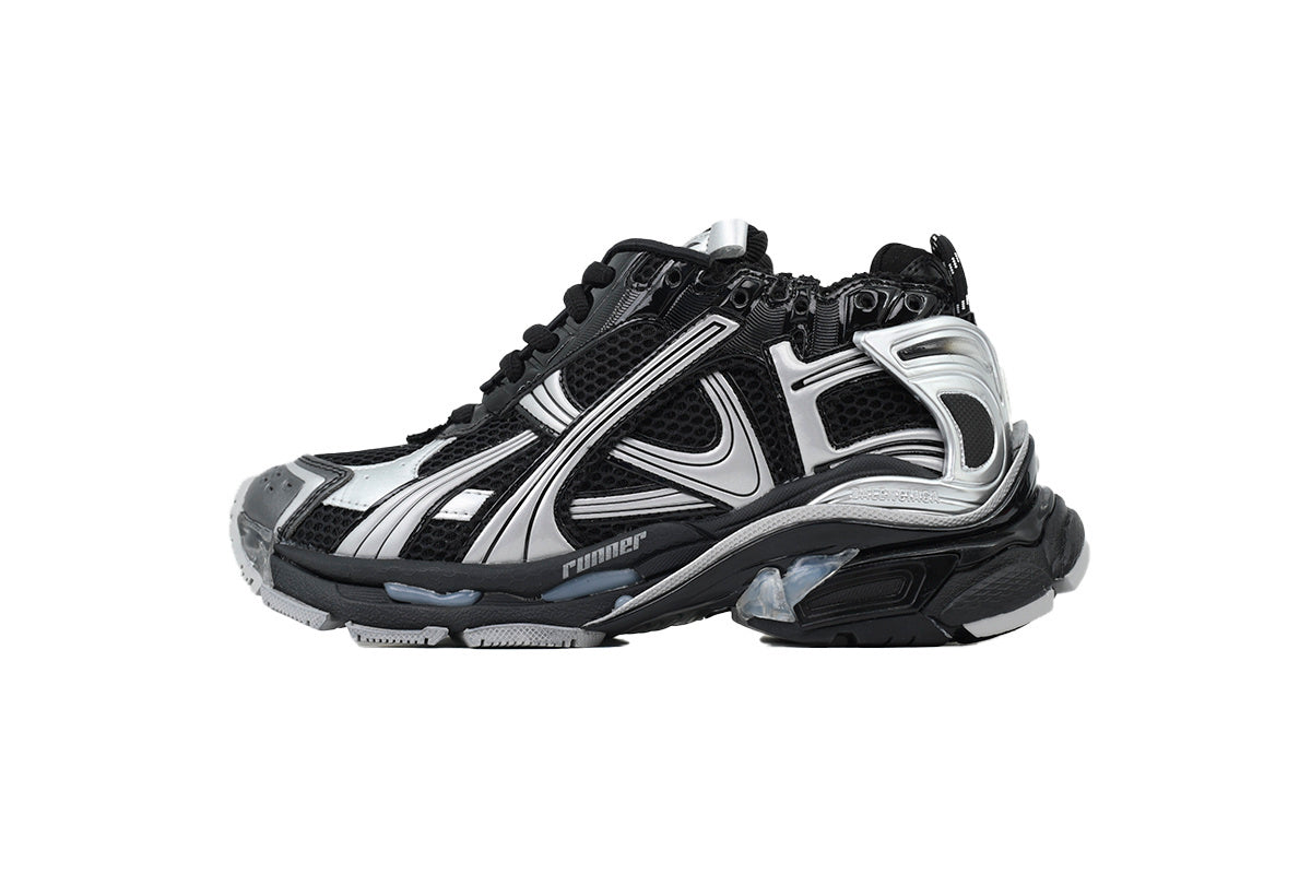 Black and white athletic shoes on a white background