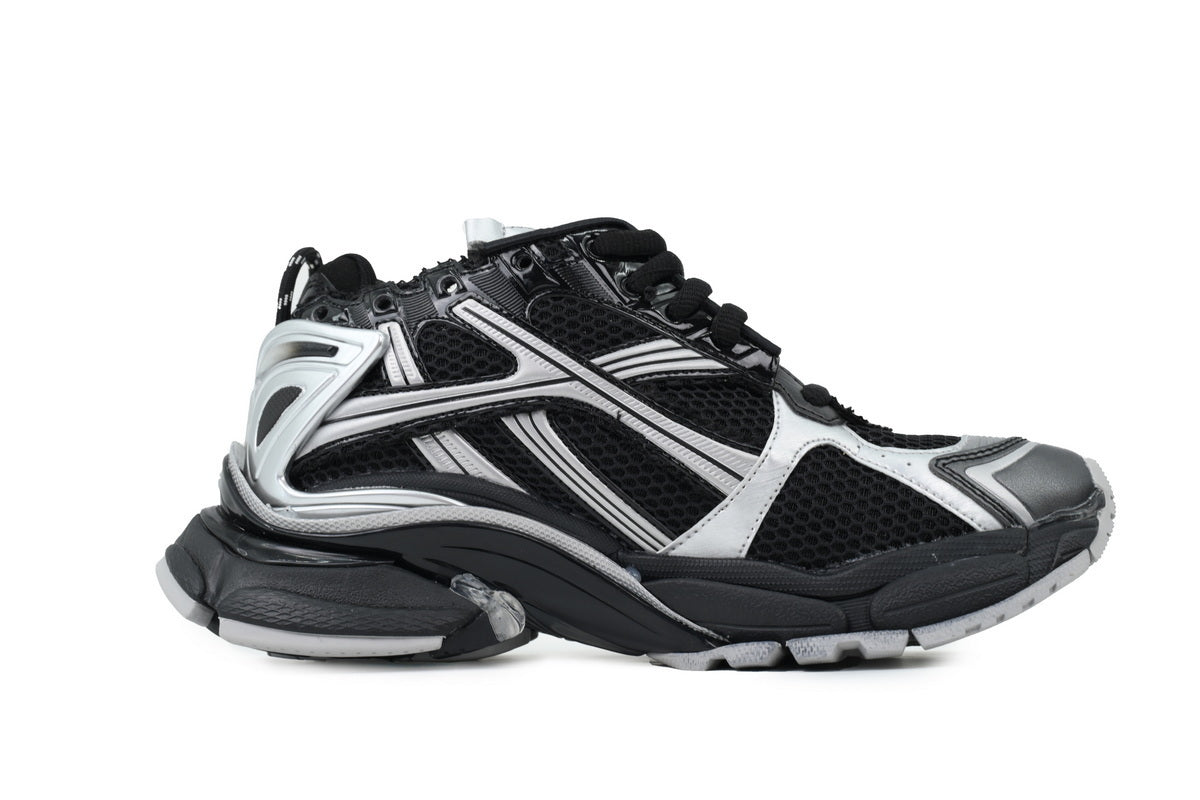 Black and white athletic shoe on a white background