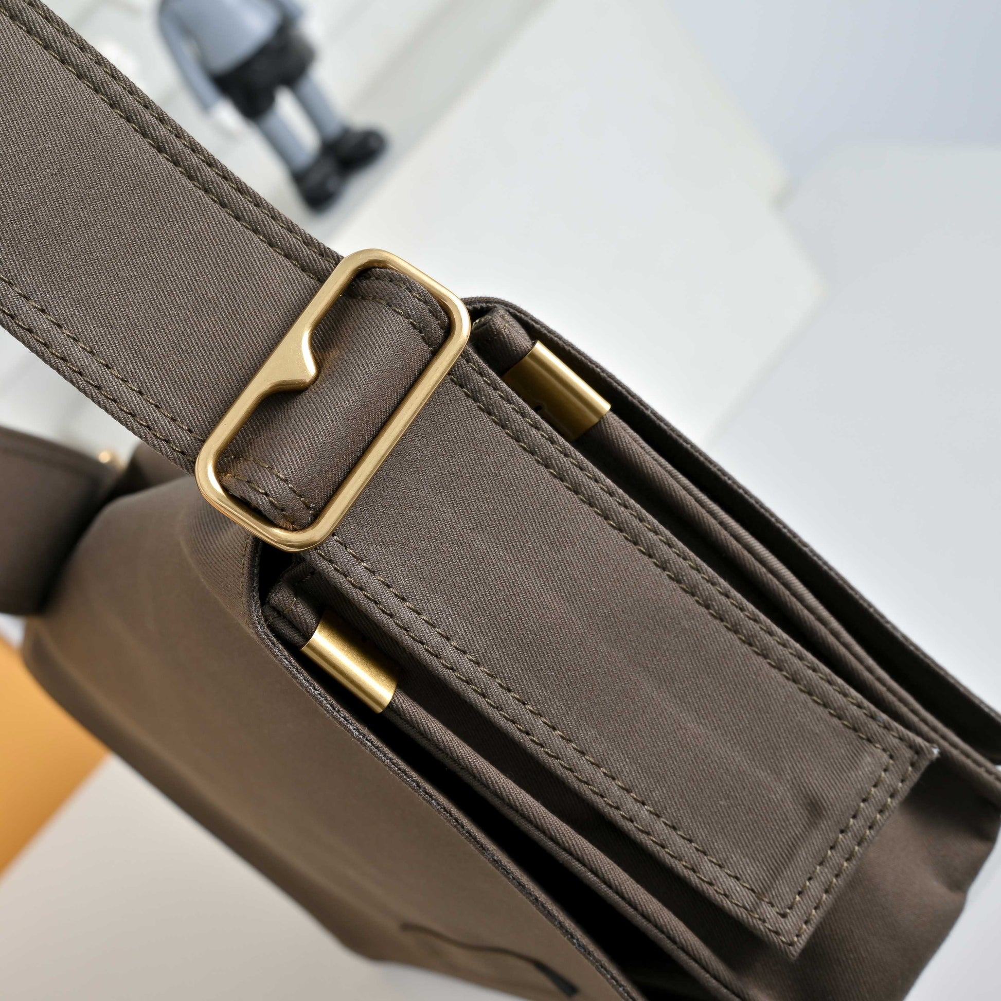 Embossed Leather Messenger Bag