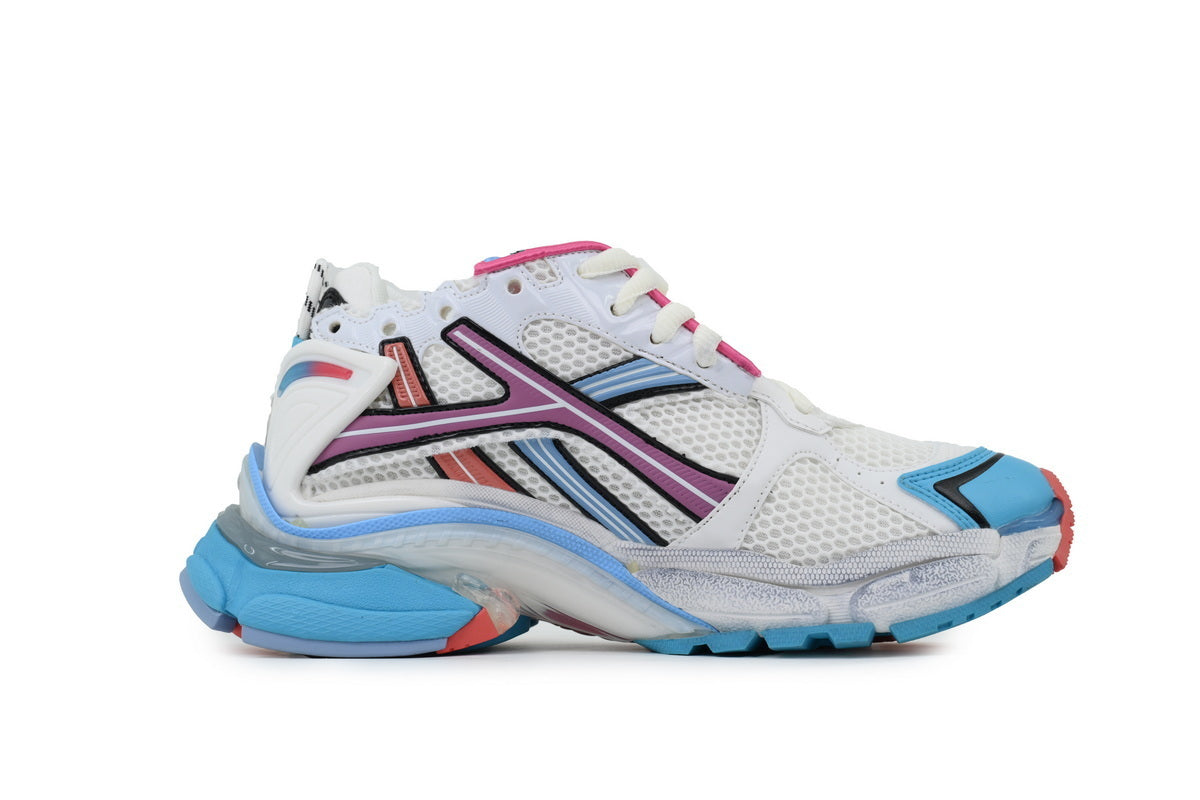 Multicolored running shoe on a white background