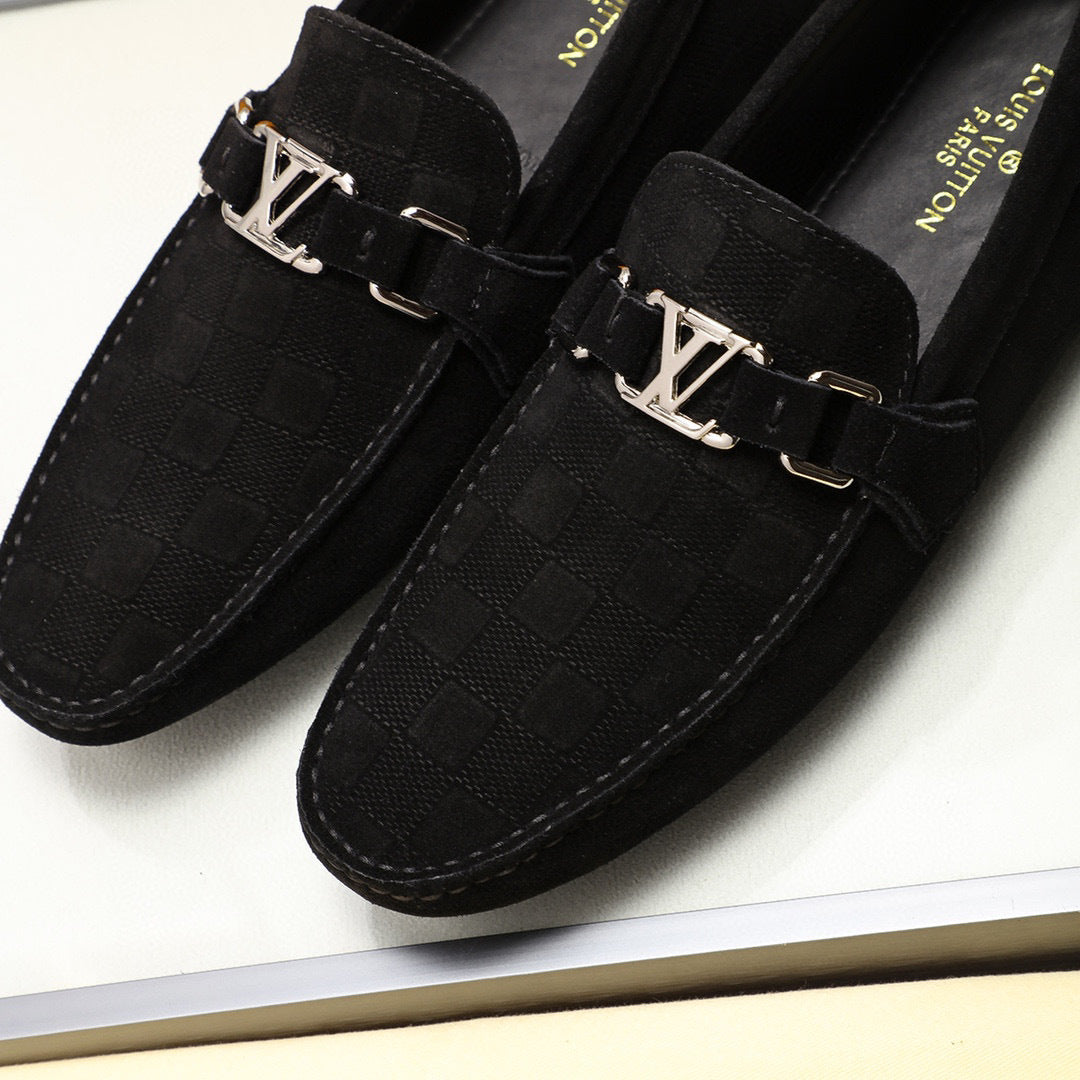 Black Textured Slip-On Loafers – Polished Metal Accent