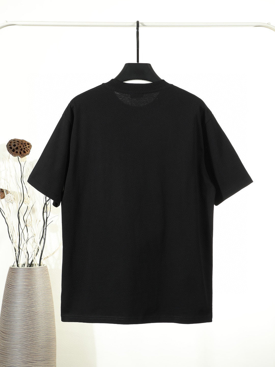 Black or White Distressed Letter Graphic T-Shirt with Color Accents