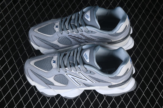 Classic gray athletic sneakers featuring a layered mesh and synthetic upper, cushioned midsole, supportive lace-up construction, and durable rubber outsole. Designed for everyday casual wear, walking, and streetwear styling.