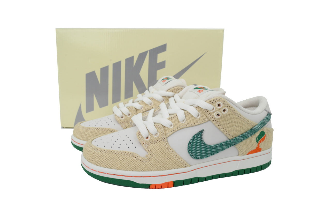 Cream and green canvas low-top sneaker with white leather panels, lace-up closure, and rubber outsole displayed from front and side angles.