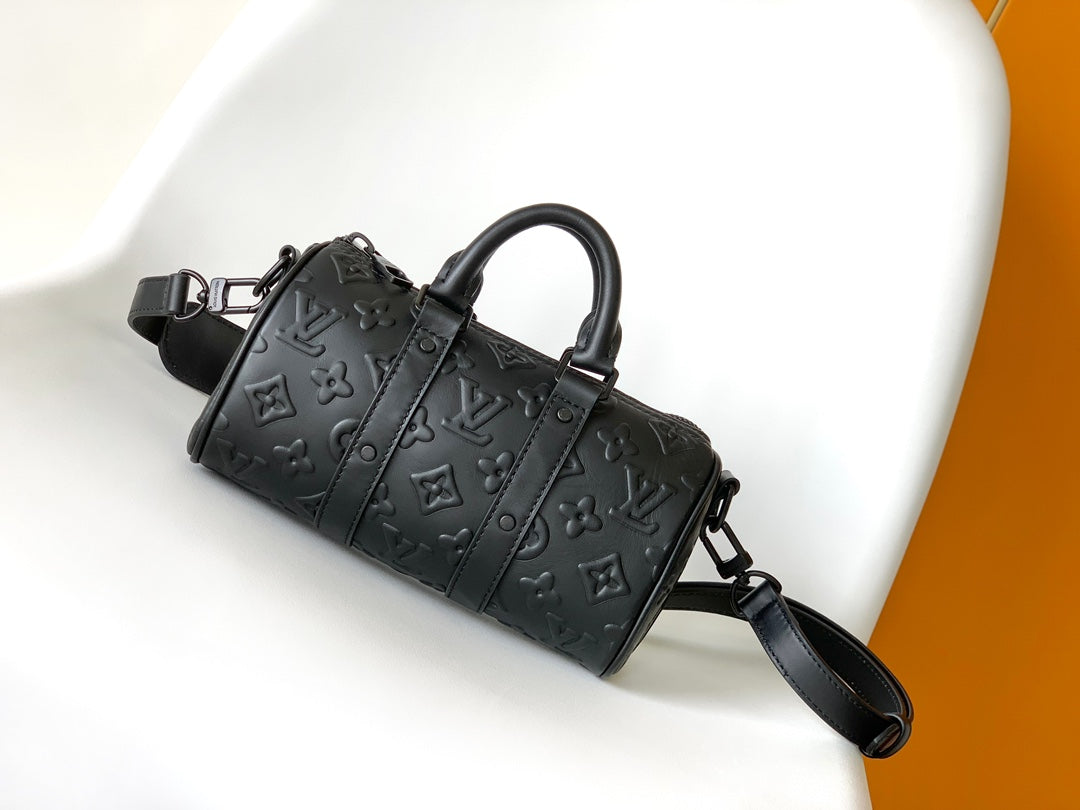 Keepall Bandoulière 25=  black Taurillon Monogram
