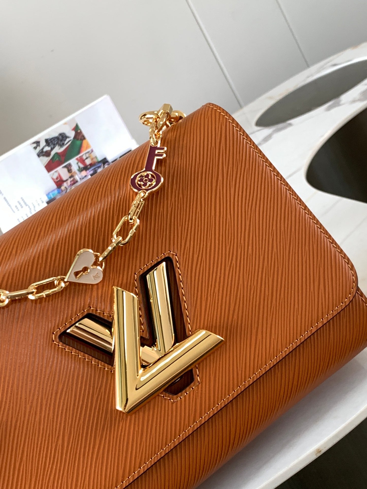 Epi Twist Shoulder Bag MM Gold Cipango