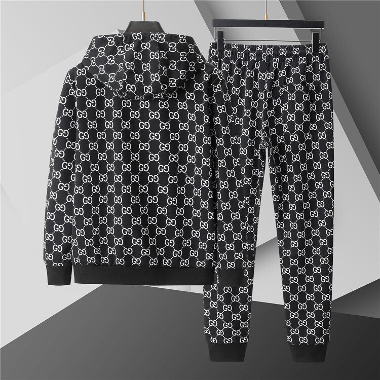 Black hoodie and pants with white pattern on a gray background