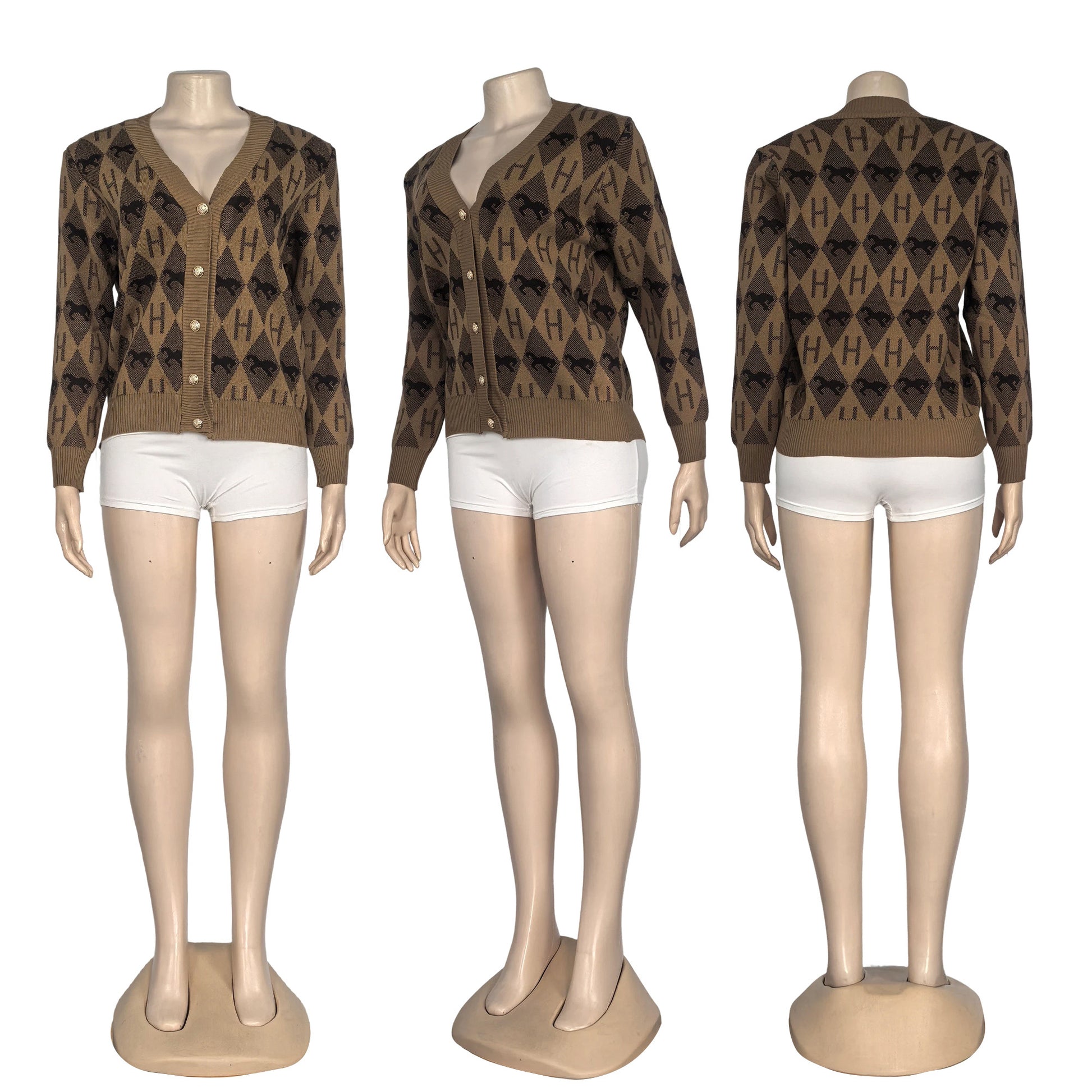 Three mannequins wearing patterned brown sweaters and white shorts on a white background
