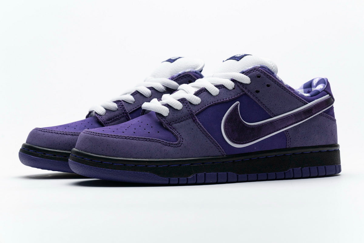 Purple sneakers with white laces on a white background