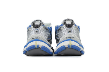 Pair of sneakers with blue accents on a white background