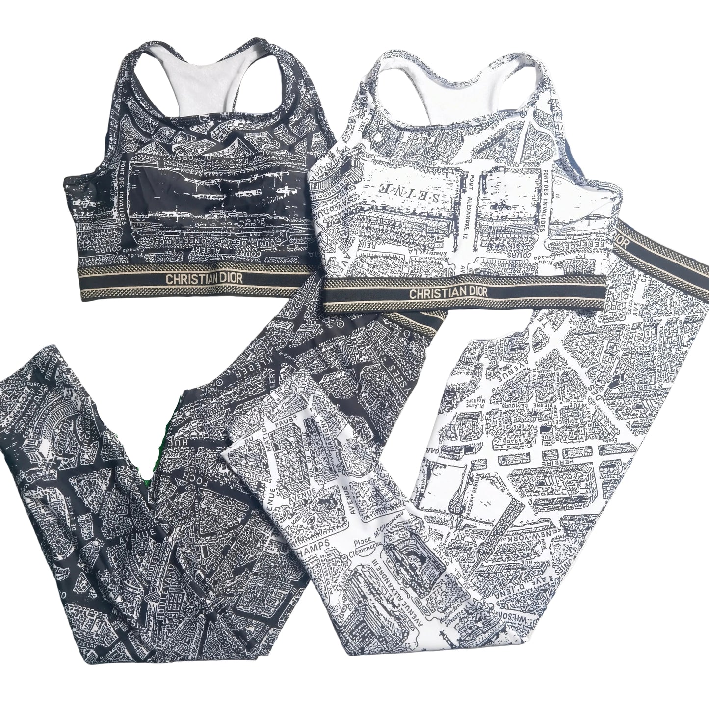 black and white two-piece activewear set featuring a bold all-over map-style print. I