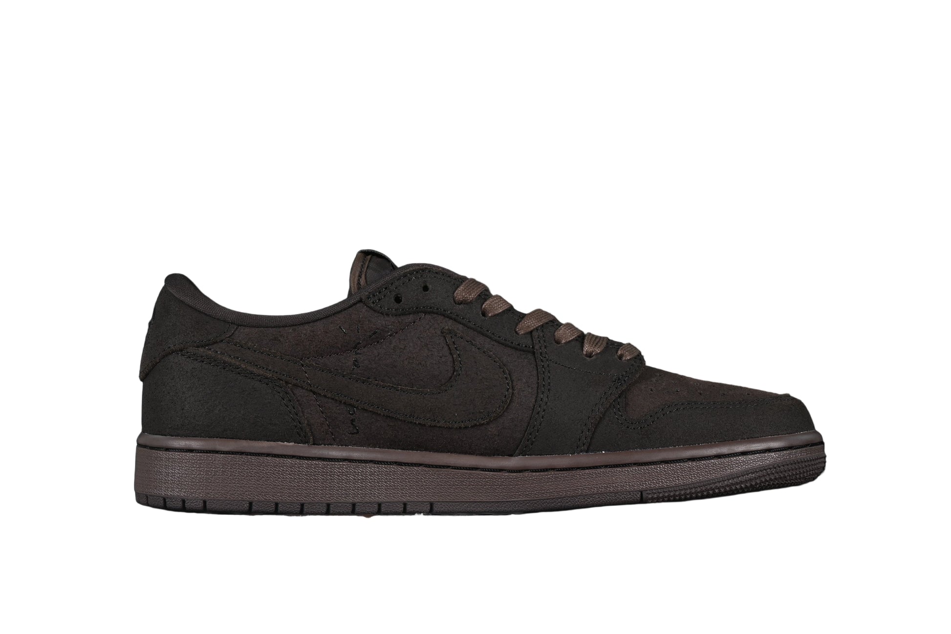 Dark brown sneaker on a black background