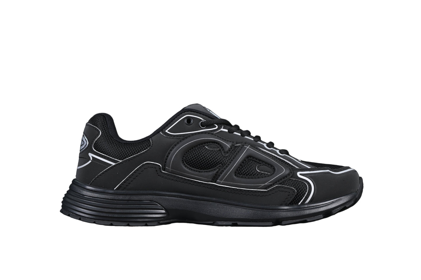 Black athletic shoe on a black background