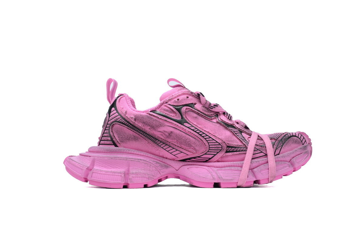 Pink running shoe on a white background