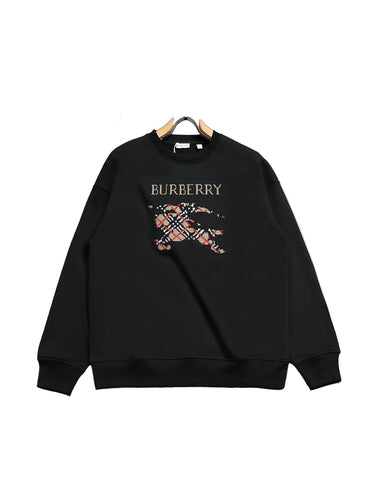 Black  sweatshirt on a hanger against a gray background