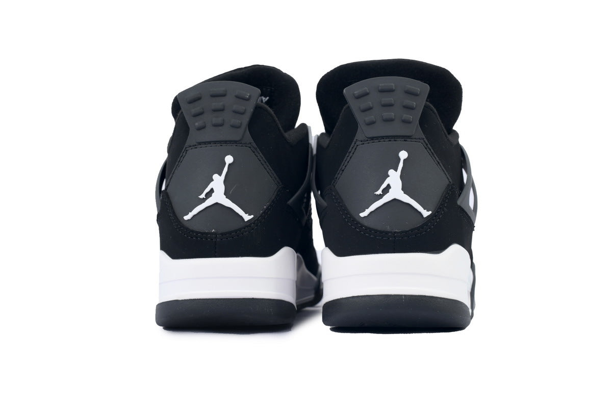 Black and white sneakers with a graphic  on a white background