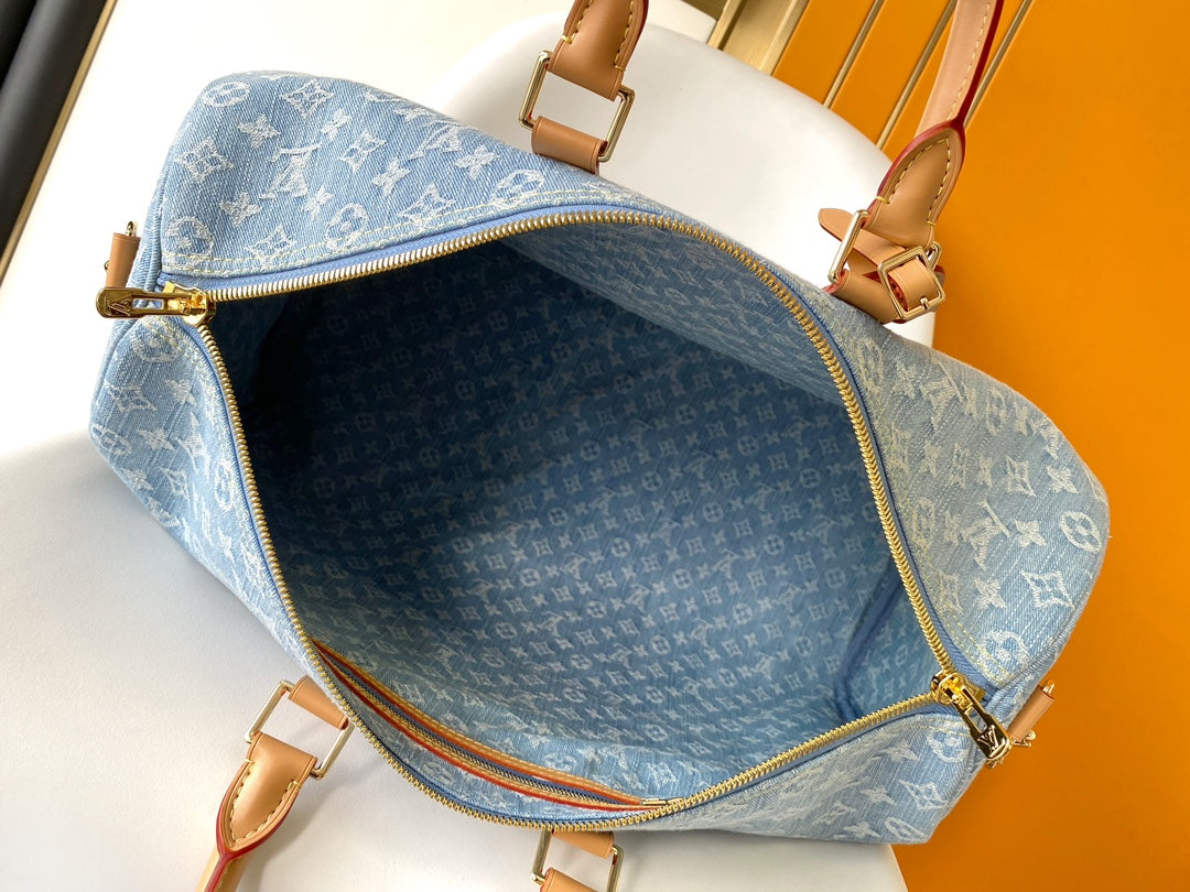 inside Keepall Bandouliere 45 Sky Blue Denim – Adjustable Shoulder Strap