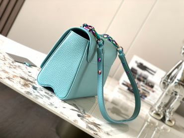 side Summer Splash Twist MM bag  iridescent blue grained calfskin leather