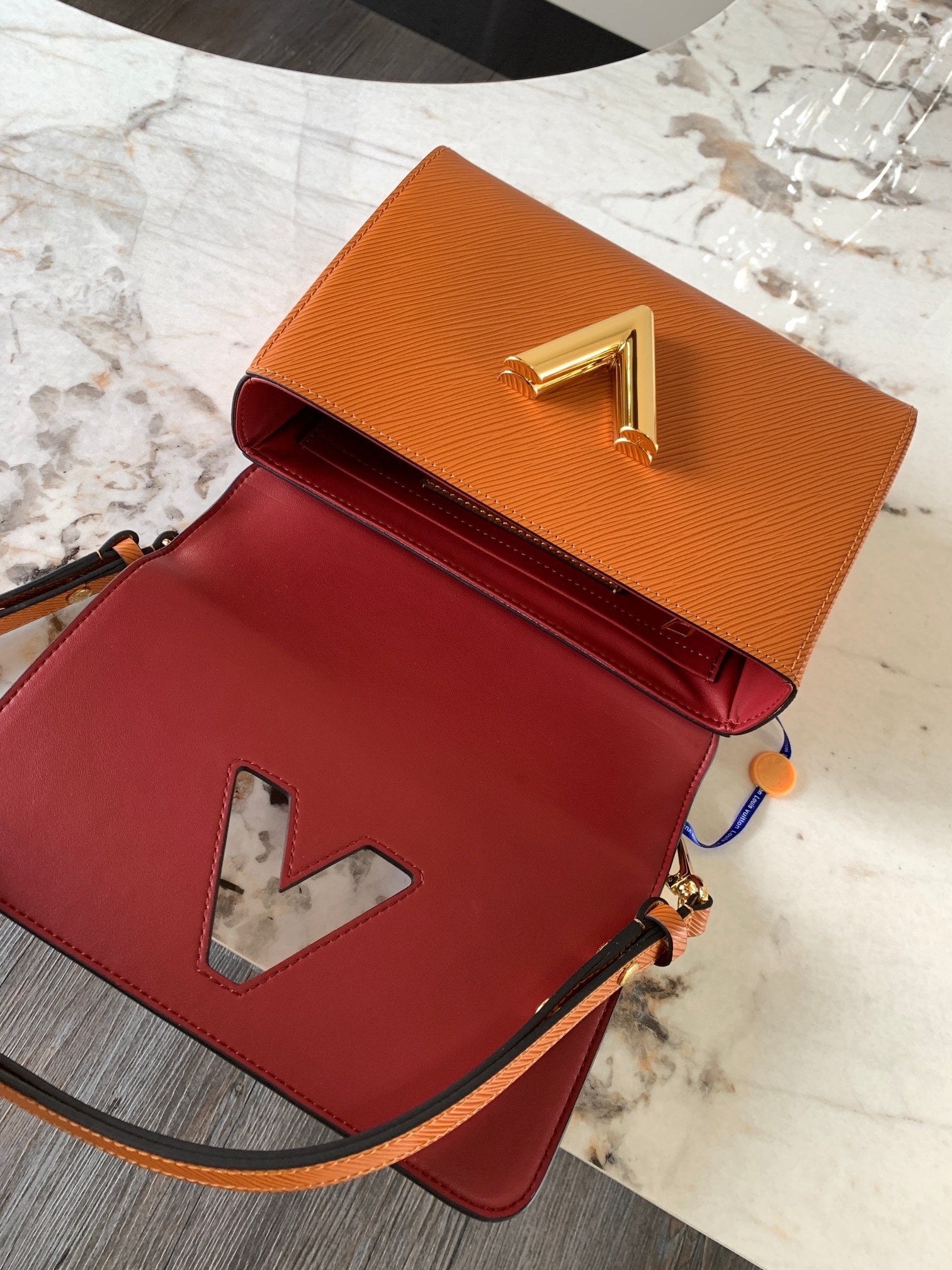 top Epi Twist Shoulder Bag MM Gold Cipango
